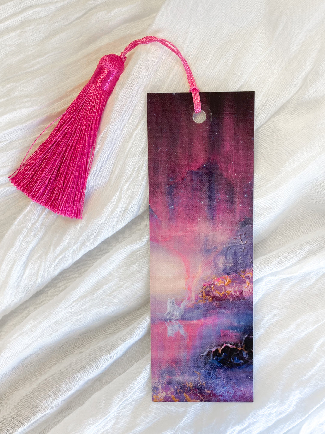 Front view of a fantasy-inspired art bookmark with a tassel.