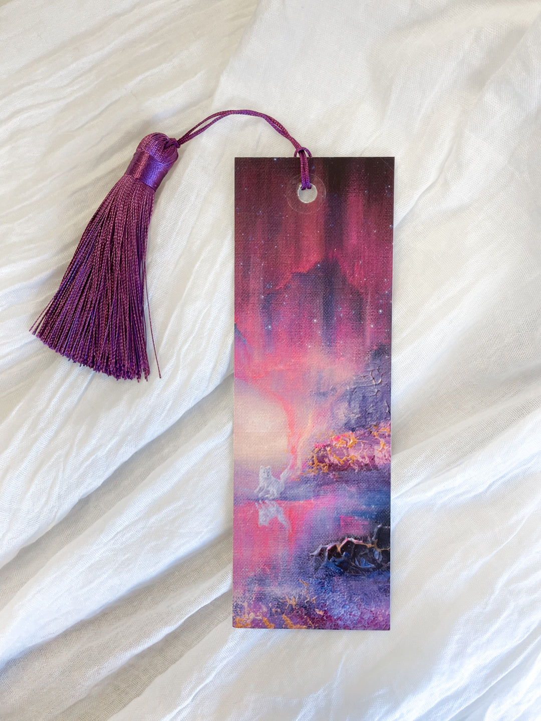 Front view of a fantasy-inspired art bookmark with a tassel.