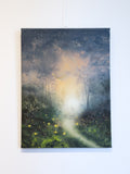 Forest themed canvas print hanging on the wall.