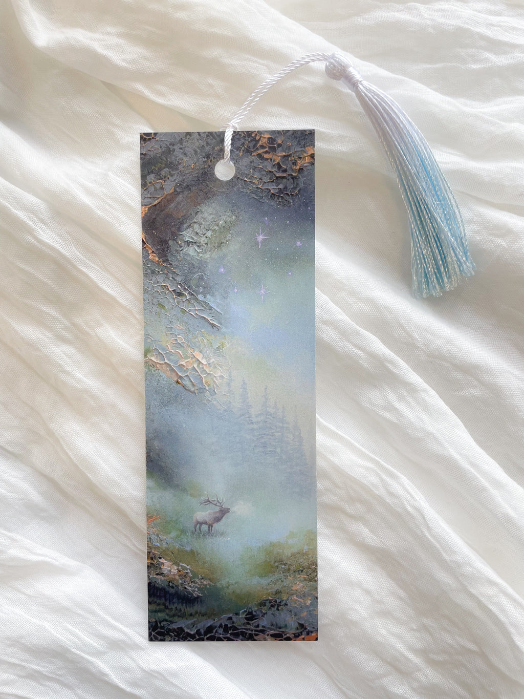 Front view of a fantasy-inspired art bookmark with a tassel.