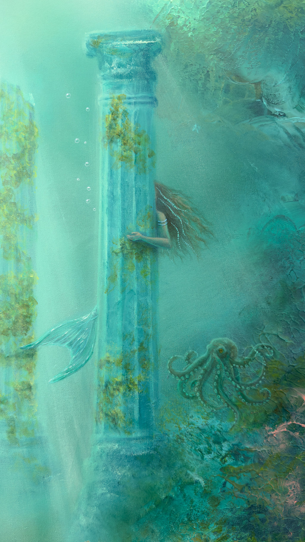 Details of the ancient column and the mermaid behind it.