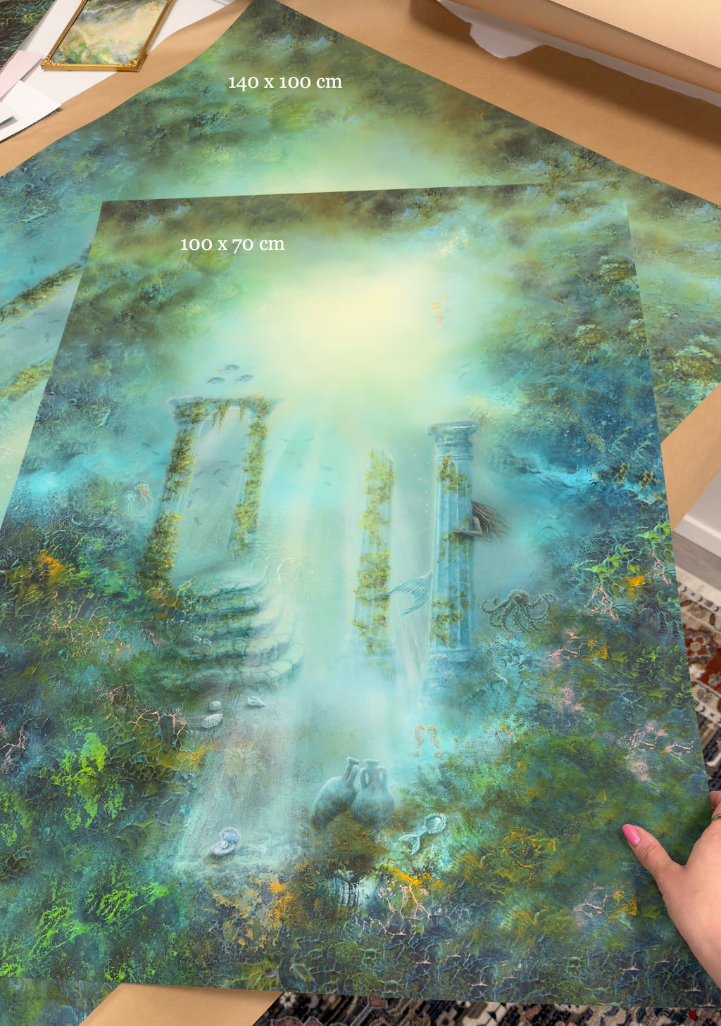 Details of the print materials and different sizes on a table.