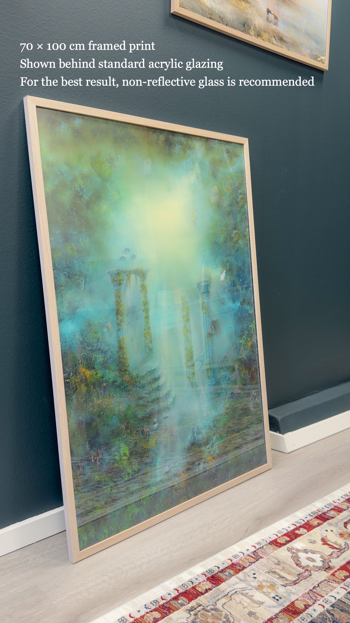 Side view of a framed semi-abstract seascape painting leaning against a wall.