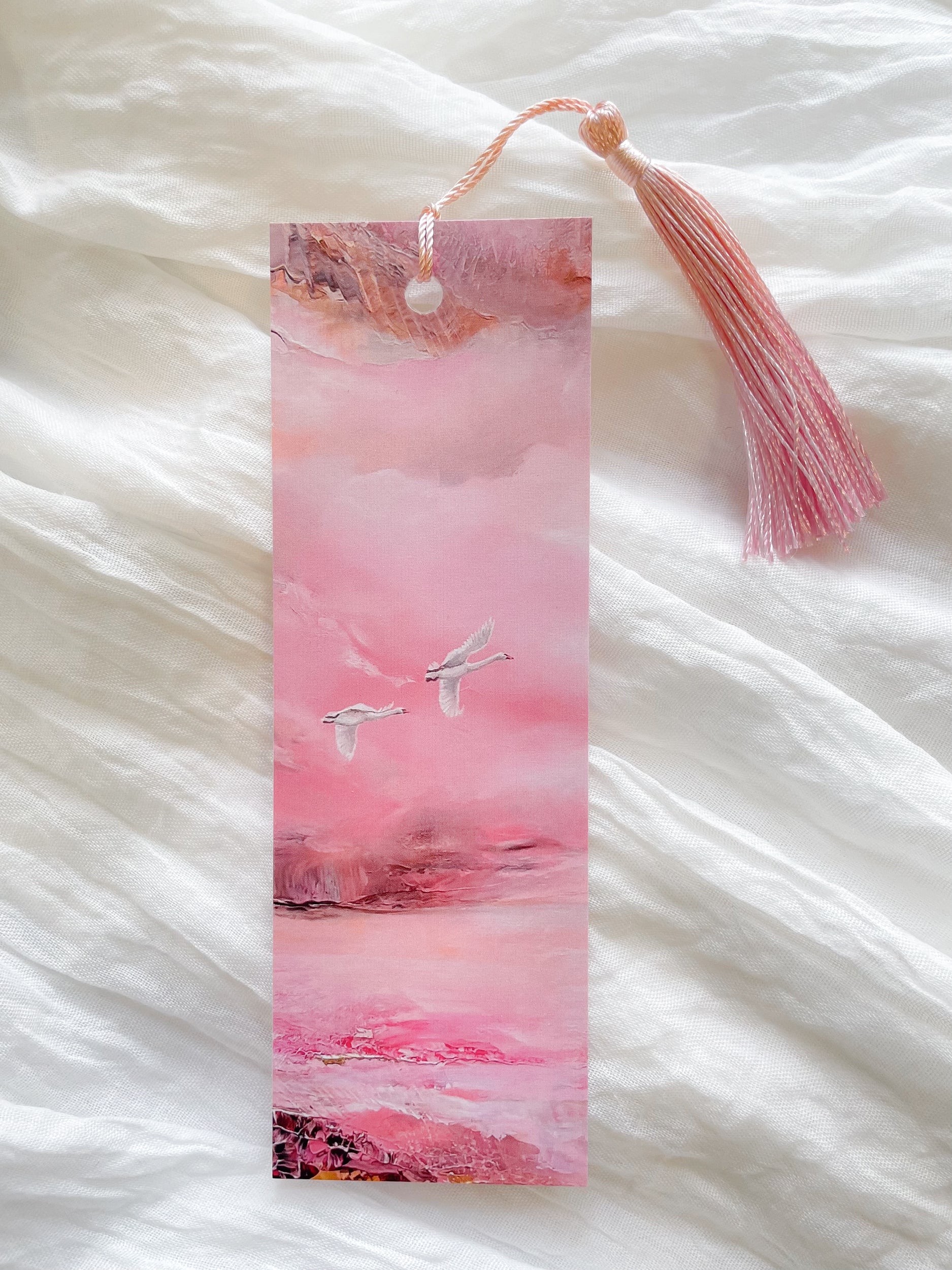 Close-up of a fantasy-inspired art bookmark showing the printed artwork and tassel.