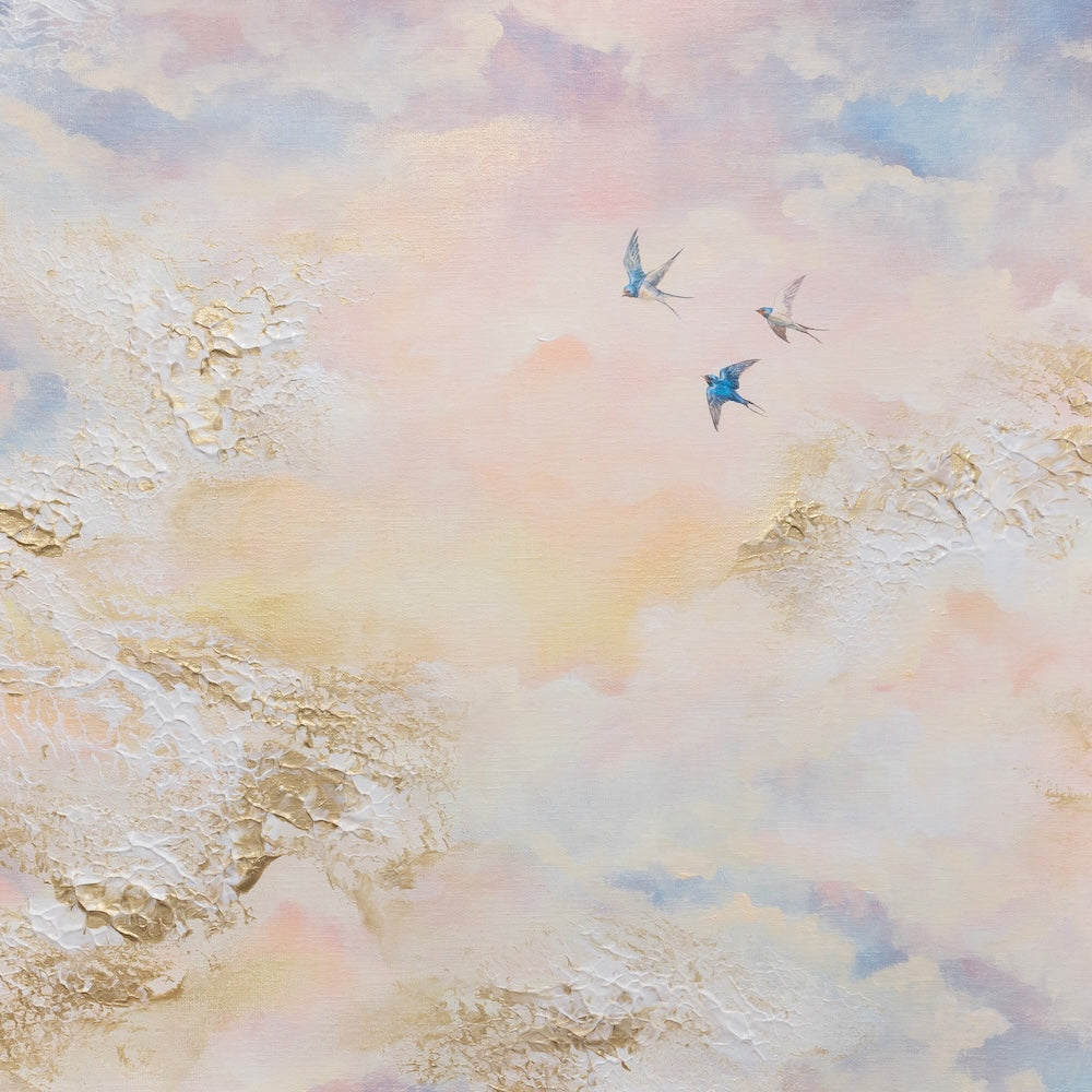 Semi-abstract fine art print of a pastel sky with swallows flying among glowing clouds.