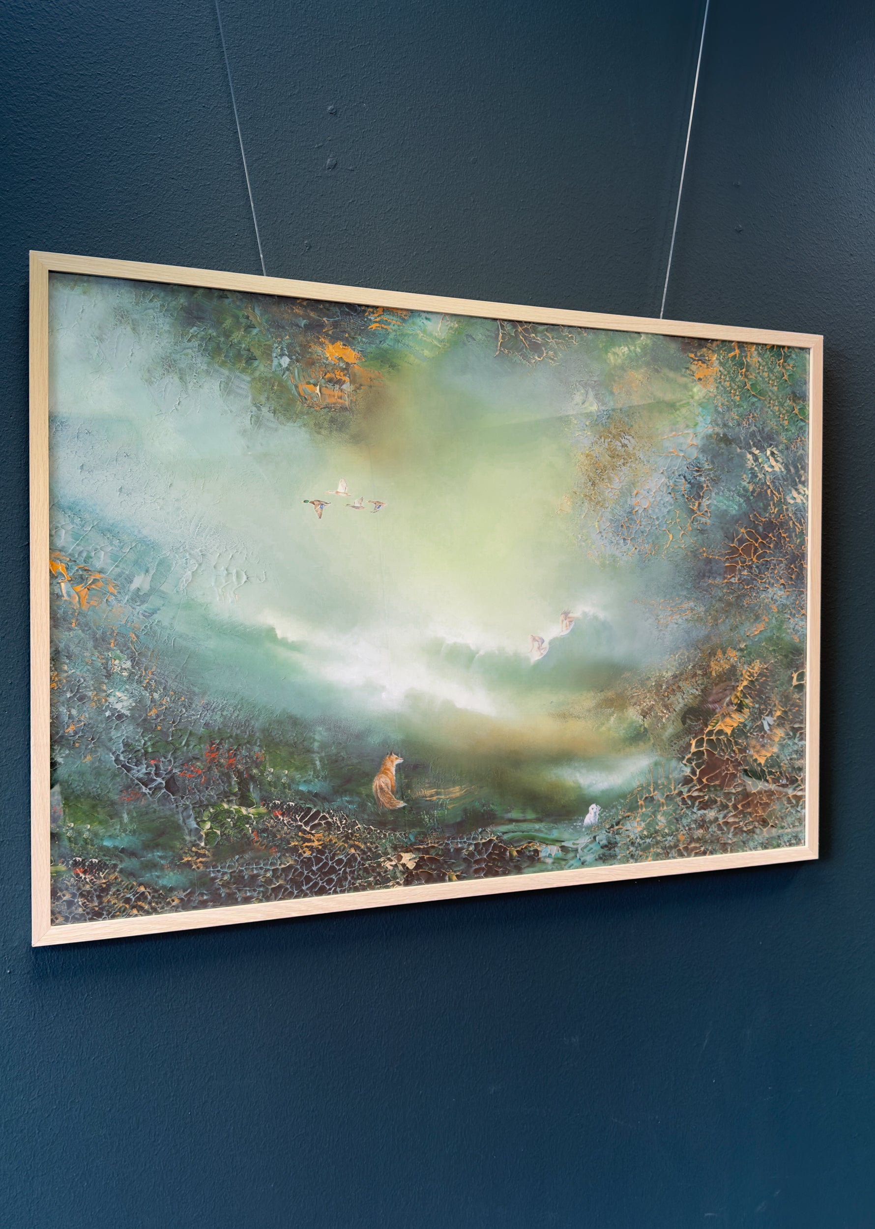 Framed fine art print displayed on a wall.