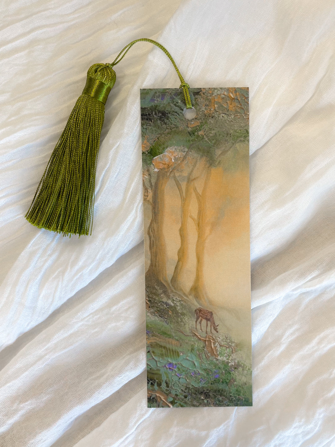 Front view of a fantasy-inspired art bookmark with a tassel.