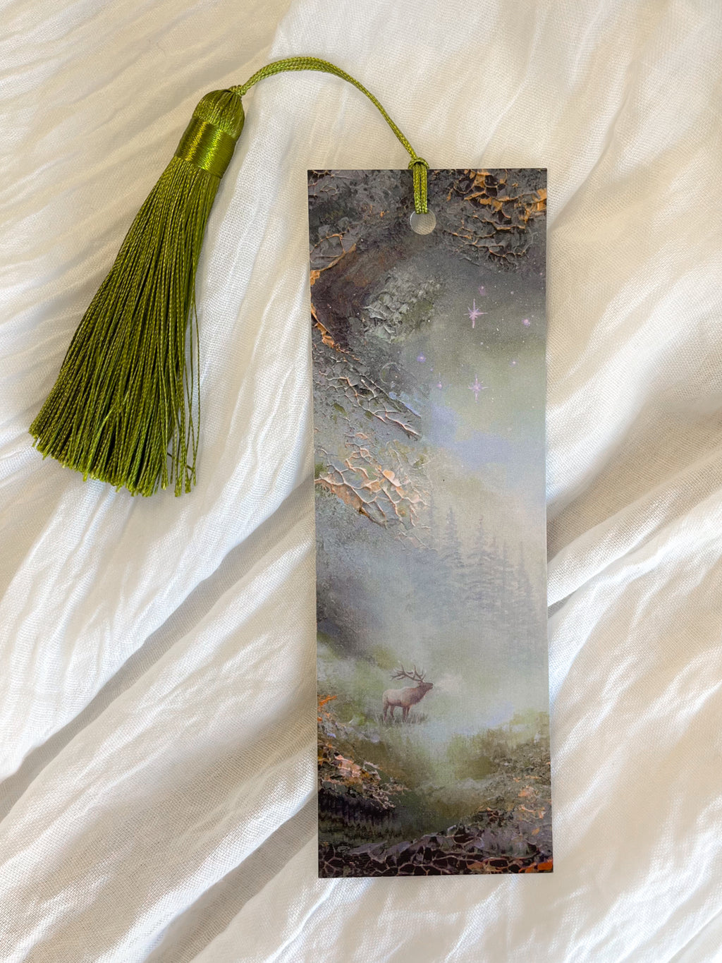 Front view of a fantasy-inspired art bookmark with a tassel.