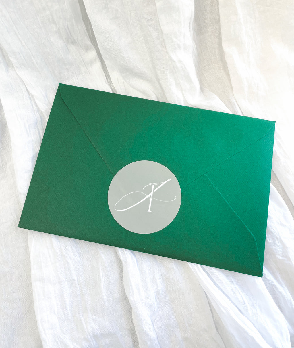 Green mystery envelope containing a surprise A5 fine art print and bookmark.