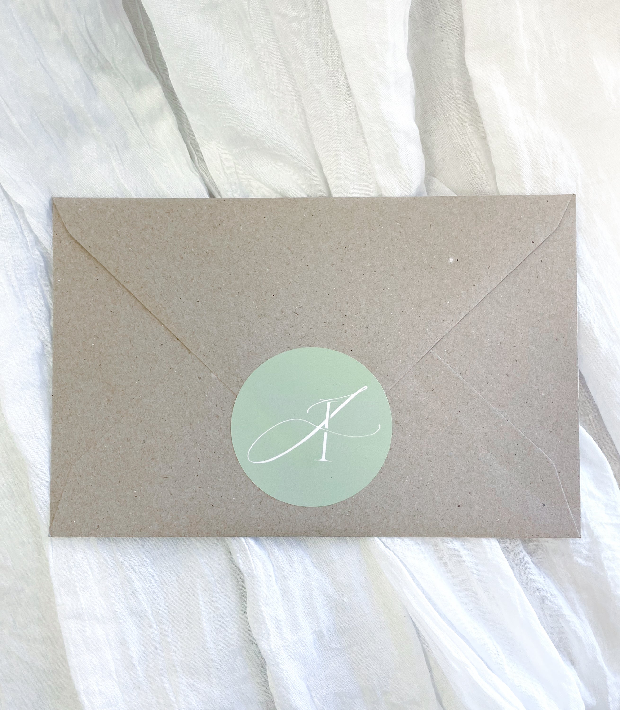 Natural kraft mystery envelope containing a surprise A5 fine art print.
