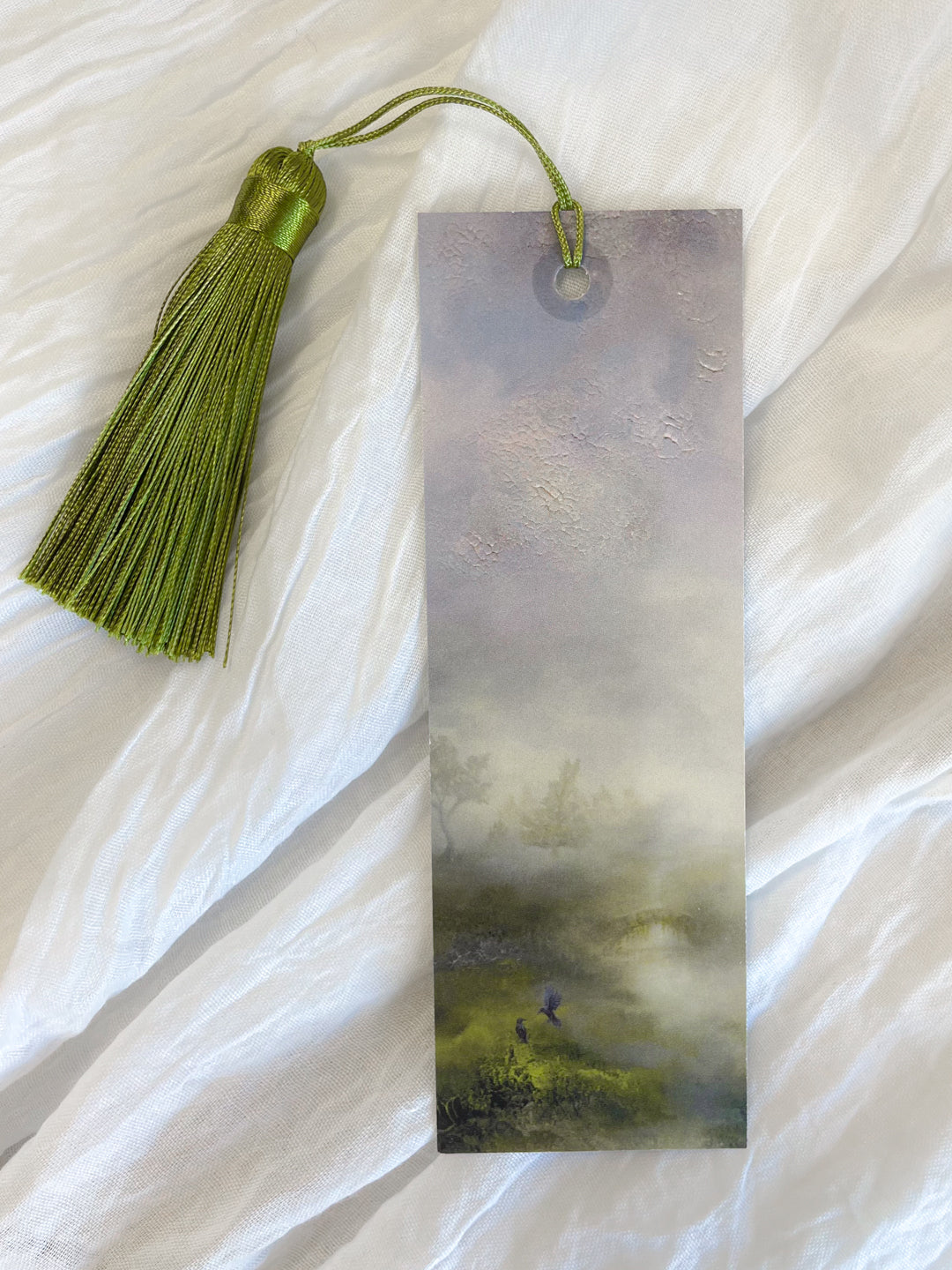 Front view of a fantasy-inspired art bookmark with a tassel.