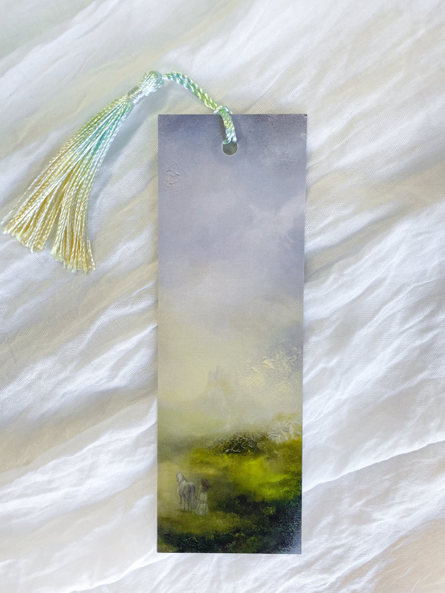 Fantasy-inspired art bookmark displayed with a matching tassel.