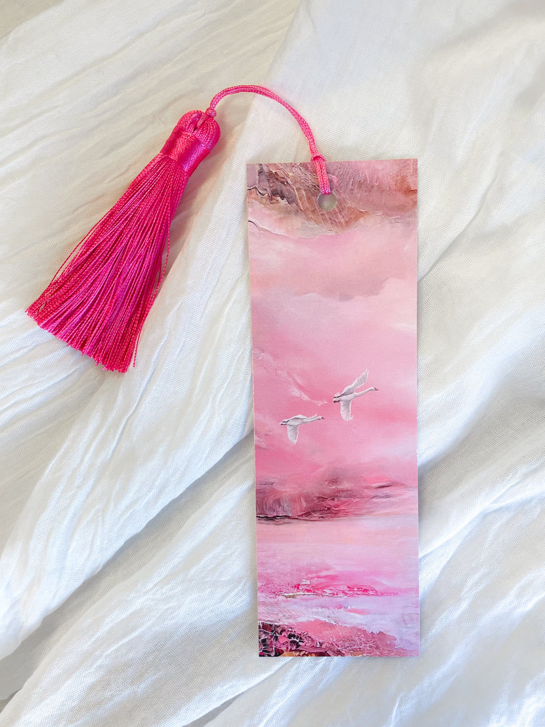 Front view of a fantasy-inspired art bookmark with a tassel.